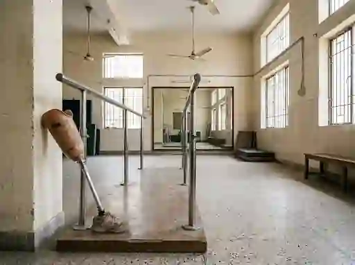 Parallel bars in a rehabilitation room with a prosthetic leg